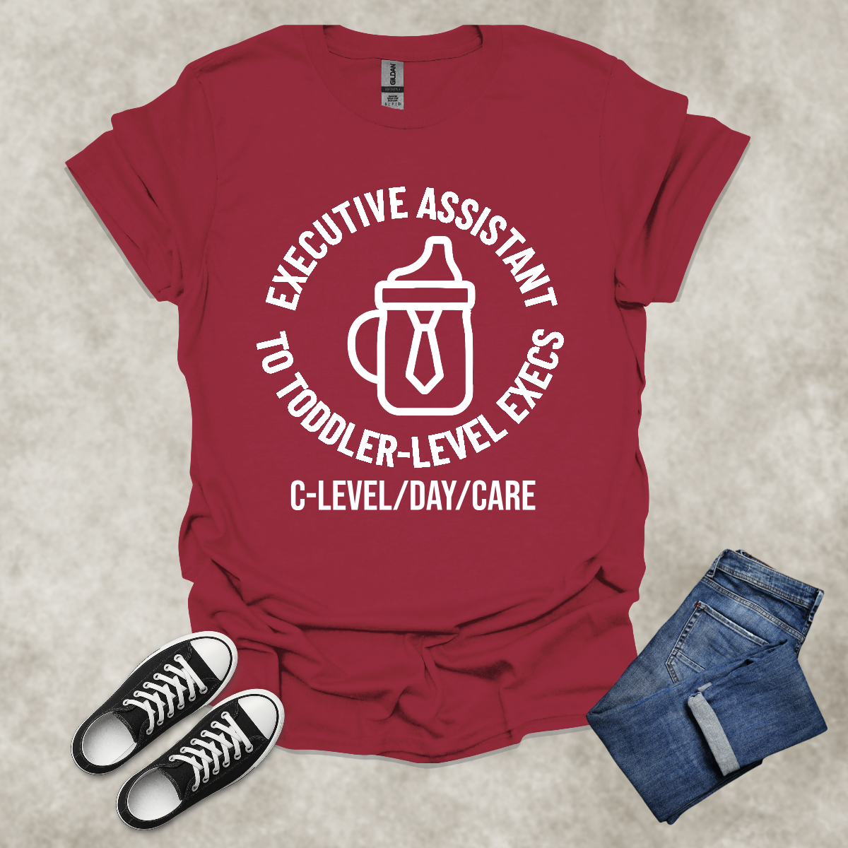 EXE ASSISTANT TO TODDLER-LEVEL EXECS: C-LEVEL/DAY/CARE — Corporate Satire Tee: Unisex Softstyle T-Shirt