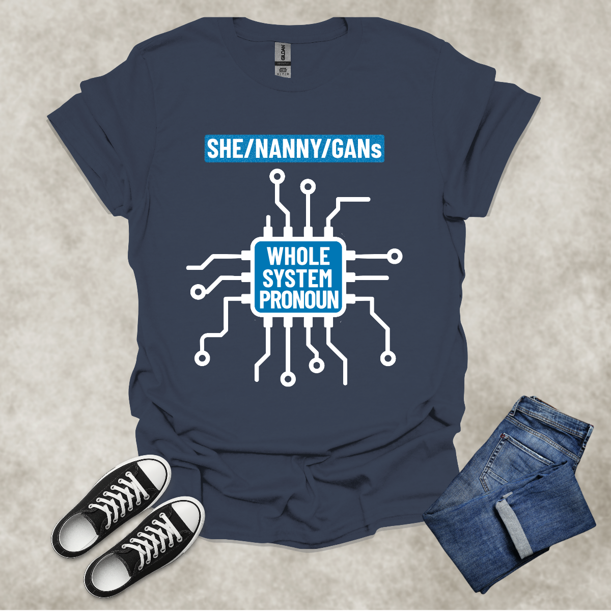 SHE/NANNY/GANs: WHOLE SYSTEM PRONOUN — Corporate Satire Tee: Unisex Softstyle T-Shirt