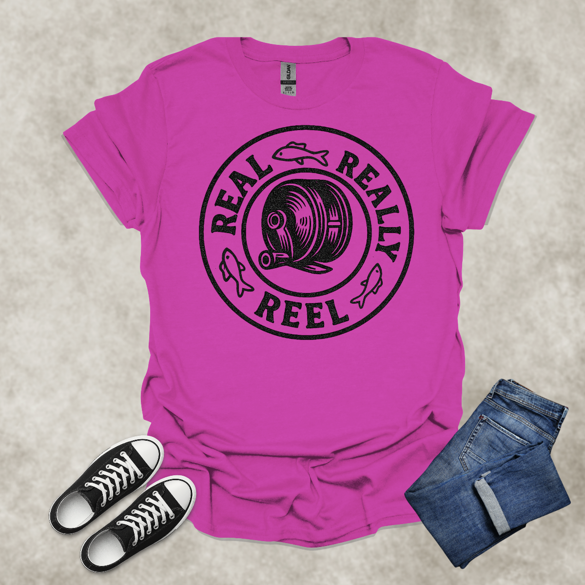 REAL: REALLY: REEL — Fishing Humor Graphic Tee: Unisex Softstyle T-Shirt