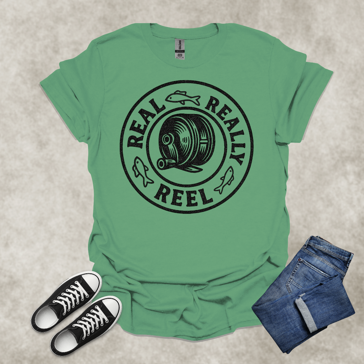 REAL: REALLY: REEL — Fishing Humor Graphic Tee: Unisex Softstyle T-Shirt
