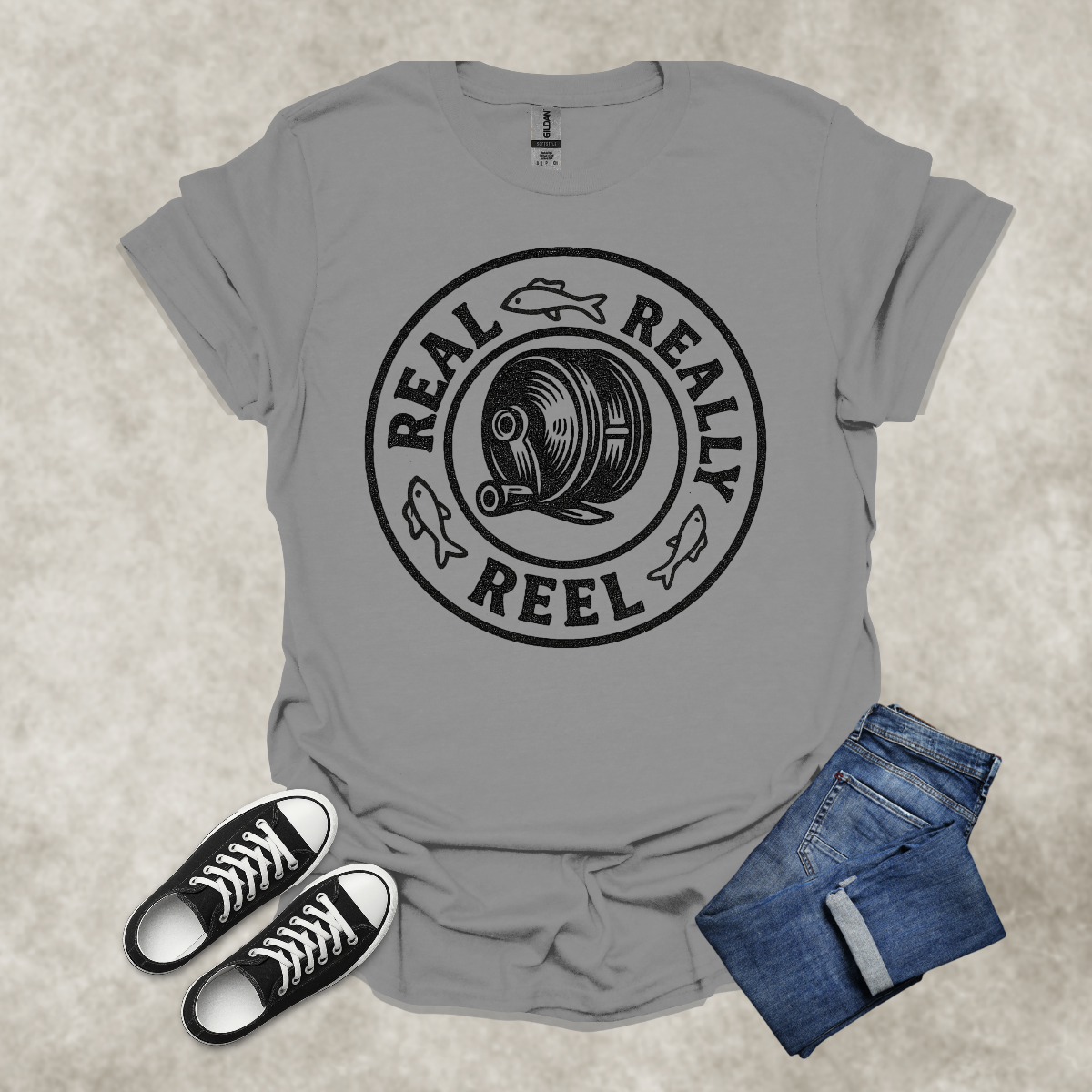 REAL: REALLY: REEL — Fishing Humor Graphic Tee: Unisex Softstyle T-Shirt