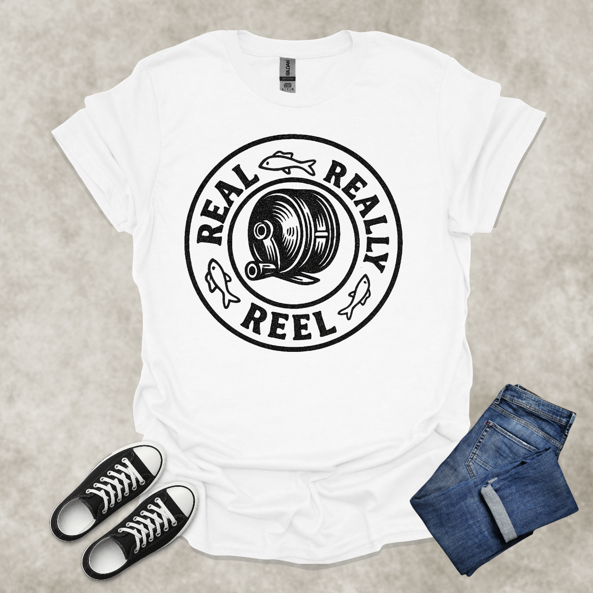 REAL: REALLY: REEL — Fishing Humor Graphic Tee: Unisex Softstyle T-Shirt