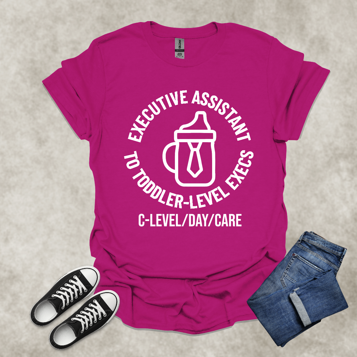 EXE ASSISTANT TO TODDLER-LEVEL EXECS: C-LEVEL/DAY/CARE — Corporate Satire Tee: Unisex Softstyle T-Shirt