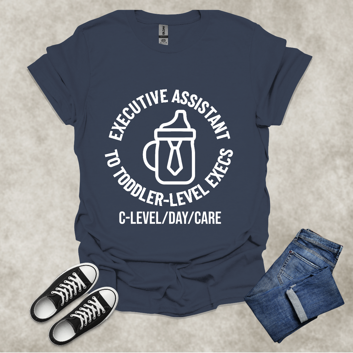 EXE ASSISTANT TO TODDLER-LEVEL EXECS: C-LEVEL/DAY/CARE — Corporate Satire Tee: Unisex Softstyle T-Shirt