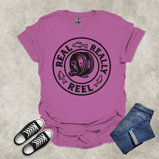 REAL: REALLY: REEL — Fishing Humor Graphic Tee: Unisex Softstyle T-Shirt