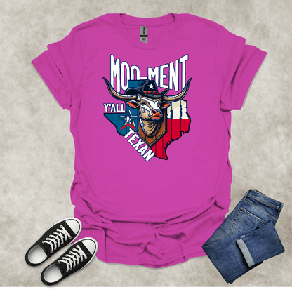 MOO-MENT Y’ALL TEXAN — Texas State Pride Humor Tee: Unisex Softstyle T-Shirt